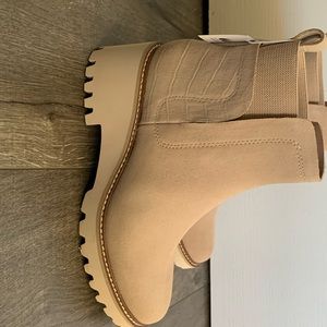 Brand new Chelsea boots. Never worn.